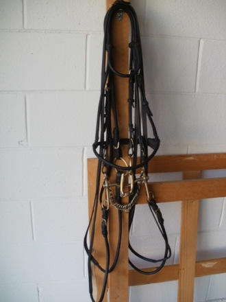 German rolled black full bridle